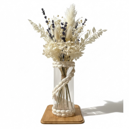 Glass vase with seashells ornaments