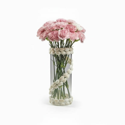 Glass vase with seashells ornaments