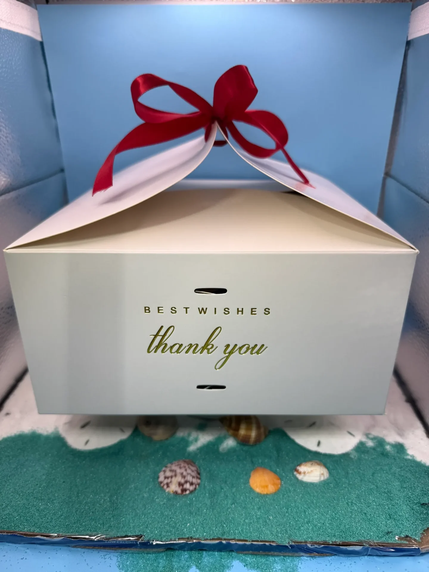 Gift box with red ribbon